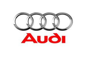 Logo Audi, quatro anéis cromados sobrepostos em fundo branco, identidade visual minimalista e elegante